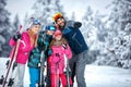 Skiing, winter, snow, sun and fun - family enjoying holiday vacations Royalty Free Stock Photo